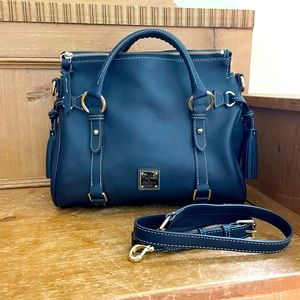 Navy blue Dooney & Bourne top handle bag with shoulder strap and dust cover